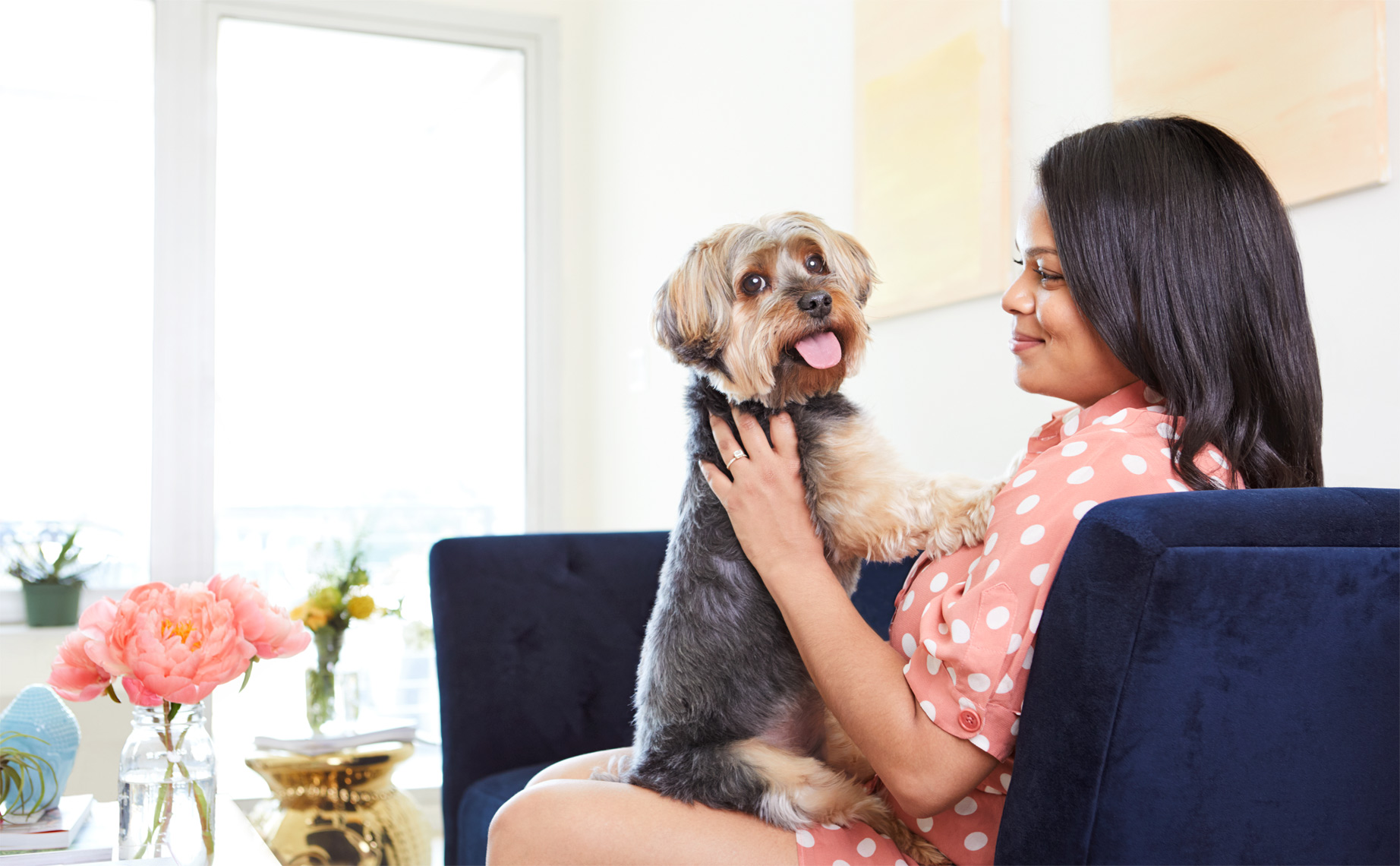 Woman with yorkshire terrier